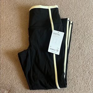 NWT Athleta Ultra High Rise Elation 7/8 Legging Size Small Black and Yellow